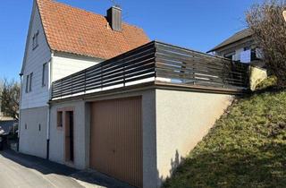 Haus kaufen in 97797 Wartmannsroth, kleines Wohnhaus mit Garage und Terrasse