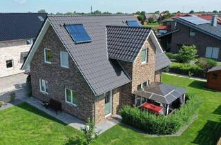 Einfamilienhaus kaufen in 26219 Bösel, Bösel - Landhaus mit Kapitänsgiebel in Petersdorf