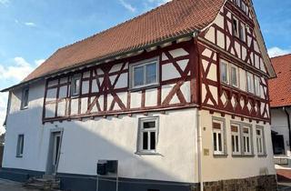 Haus kaufen in 61191 Rosbach, Rosbach vor der Höhe - Modernisiertes Fachwerkhaus mit Anbau in Rodheim v. d. Höhe