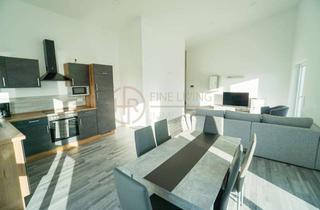 Wohnung kaufen in 97990 Weikersheim, DG-Wohnung mit großem Balkon und Top-Aussicht! Energieeffizienz A+ plus PV-Anlage!
