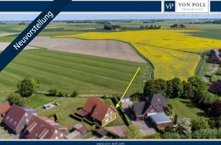 Wohnung kaufen in 26427 Werdum, Stilvolle Erdgeschosswohnung mit Garten in Werdum – Ihr Rückzugsort an der Nordsee