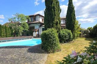 Einfamilienhaus kaufen in 55566 Bad Sobernheim, Schickes Einfamilienhaus in mediterranem Flair mit Pool und Wintergarten