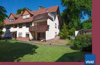 Mehrfamilienhaus kaufen in 61206 Wöllstadt, TOP-Mehrfamilienhaus - gut vermietet! Viele Optionen: weitere WE, Erweiterung ...