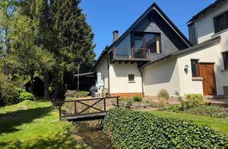 Haus kaufen in 57583 Mörlen, Zwei Wohnhäuser auf großzügigem, parkähnlichen Grundstück mit Bachlauf