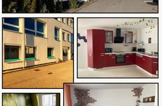 Wohnung kaufen in 06766 Bitterfeld-Wolfen, Barrierefreie Erdgeschosswohnung mit EBK und Garten