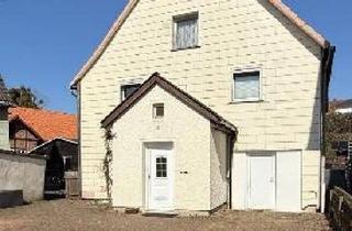 Einfamilienhaus kaufen in 37632 Eschershausen, Eschershausen - Wohnhaus in Zentraler Lage mit großem Grundstück und Nebengebäude
