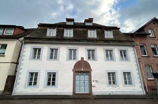 Wohnung kaufen in 37603 Holzminden, Eigentumswohnung im DG über 2 Etagen - Innenstadlage mit Balkon