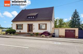Einfamilienhaus kaufen in 66773 Schwalbach, Charmantes Einfamilienhaus mit Garten & Garage in zentraler Lage von Elm