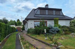 Einfamilienhaus kaufen in 28876 Oyten, freistehendes Einfamilienhaus mit großem Garten, Keller und Garage in sehr ruhiger Lage von Oyten