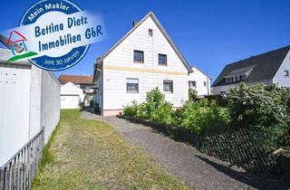 Haus kaufen in 64409 Messel, Vermietetes 2 Familienhaus mit Garage, Garten und Terrasse in ruhiger Wohnlage von Messel!