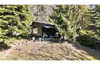 Grundstück zu kaufen in 85395 Attenkirchen, Charmantes Ferien-/Einfamilienhaus auf großem Hanggrundstück in ruhiger Naturlage, sofort bezugsfrei