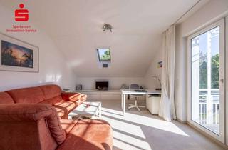 Wohnung kaufen in 85609 Aschheim, Für Singles oder Paare: Vermietete, lichtdurchflutete Dachgeschosswohnung in ruhiger Wohnlage