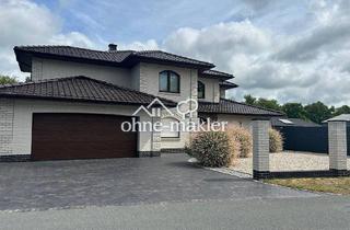 Gewerbeimmobilie kaufen in 26810 Westoverledingen, Einfamilienhaus mit Gewerbehalle, Photovoltaik, Pool, Garten