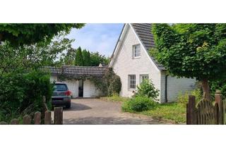 Doppelhaushälfte kaufen in 25462 Rellingen, Charmante Doppelhaushälfte mit Einliegerwohnung, Gartenidylle und Pool in Rellingen