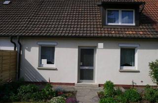 Haus kaufen in 97424 Schweinfurt, Reihenmittelhaus in ruhiger Ortsrandlage von Schweinfurt mit Garten und Garage