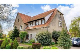 Mehrfamilienhaus kaufen in 32312 Lübbecke, Lübbecke - Voll vermietetes 2-Familienhaus mit Garten, Terrasse und Balkon in Lübbecke-Stockhausen