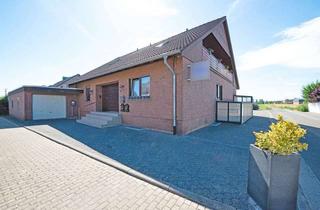 Haus kaufen in 50189 Elsdorf, Elsdorf - PHI KÖLN - Vielseitiges Zweifamilienhaus mit Garten in ruhiger Lage von Elsdorf-Giesendorf!