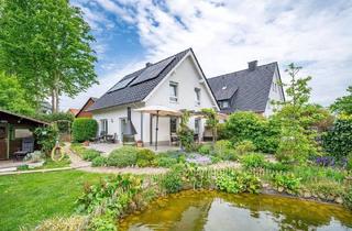 Einfamilienhaus kaufen in 33790 Halle, Halle (Westfalen) - Einziehen und wohlfühlen - modernes Einfamilienhaus mit traumhaft schönem Garten in beliebter Lage von Halle (Westf.)
