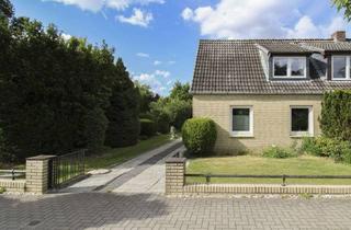Doppelhaushälfte kaufen in 25421 Pinneberg, Überwiegend modernisierte Doppelhaushälfte mit tollem Grundstück in charmanter Lage von Pinneberg.