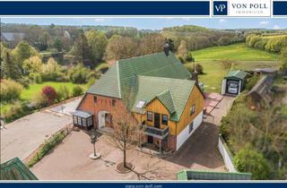 Mehrfamilienhaus kaufen in 24257 Hohenfelde, Großzügiges Mehrfamilienhaus mit Garten, Wintergarten und Garagen