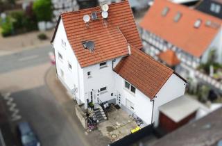 Haus kaufen in 61209 Echzell, Vielversprechendes Zweifamilienhaus mit Weitblick in zentraler Lage von Echzell