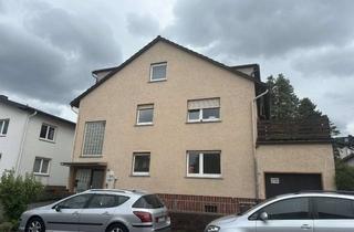 Haus kaufen in Am Zollstock 14, 35415 Pohlheim, Dreifamilienhaus mit Garten, Balkon, Garage und Ausbaupotenzial in ruhiger Lage von Pohlheim-Watzen.