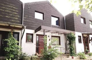 Reihenhaus kaufen in 27404 Zeven, Zeven - Vermietetes Reihenmittelhaus mit Vollkeller und Carport sucht nette Familie oder Anleger