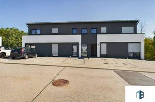 Wohnung kaufen in 55743 Idar-Oberstein, Idar-Oberstein - Moderne Erdgeschosswohnung mit Balkon - vermietetes Investment oder späteres Zuhause