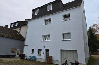 Mehrfamilienhaus kaufen in 34292 Ahnatal, Ahnatal / Heckershausen - Ahnatal-Heckershausen Mehrfamilienhaus mit 6 Wohneinheiten, Ladengeschäft und Nebengebäude
