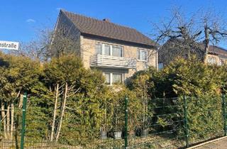 Haus kaufen in 33803 Steinhagen, Steinhagen - Zweifamilienhaus mit Baugrundstück