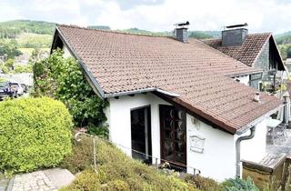 Wohnung kaufen in 57271 Hilchenbach, 2-Zimmer-Wohnung mit Garten und Balkon in Helberhausen – ein idyllischer Rückzugsort