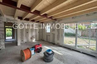 Wohnung kaufen in 33803 Steinhagen, Haus in Haus: Maisonette mit Terrasse und Garten.