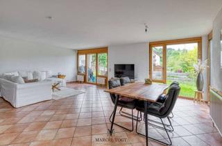 Wohnung kaufen in 73655 Plüderhausen, Stilvolle Wohnung mit Garten, Ausblick & großem Hobbyraum in Hanglage