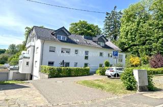 Wohnung kaufen in 53809 Ruppichteroth, Attraktive 3-Zimmer-Wohnung mit großem Balkon und Tiefgaragen-Stellplatz