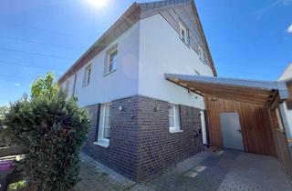 Doppelhaushälfte kaufen in 48565 Steinfurt, Optimal konzipiert! Energiesparende Doppelhaushälfte mit PV-Anlage und Carport in Borghorst