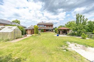 Haus kaufen in 48485 Neuenkirchen, Raum für neue Lebensgeschichten – Zweifamilienhaus im Herzen der Stadt