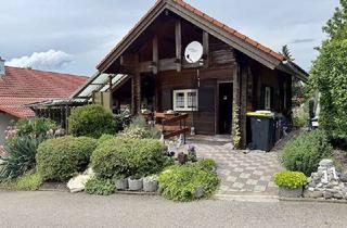 Haus kaufen in 87767 Niederrieden, Charmantes Blockhaus mit Terrasse, Carport und idyllischem Kräutergarten – Ihr Rückzugsort in ruhige