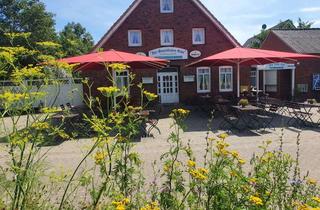Haus kaufen in Deichweg 10, 27639 Nordholz, Haus mit 4 Wohnungen + Gastro direkt am Deich der Wurster Nordseeküste