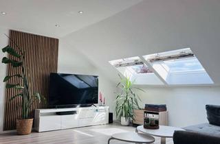 Wohnung kaufen in 86462 Langweid, Charmante Dachgeschosswohnung mit Wohlfühlcharakter