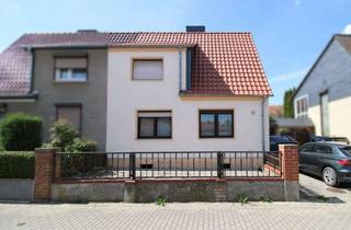 Doppelhaushälfte kaufen in 39418 Staßfurt, Doppelhaushälfte mit grünem Garten