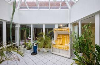 Haus kaufen in 85551 Kirchheim, Lichtdurchfluteter Bungalow mit Atrium – barrierefreies Wohnjuwel mit vielfältigem Raumangebot