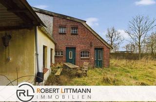 Grundstück zu kaufen in 26969 Butjadingen, Charmantes Grundstück mit historischem Stall und großem Holzunterstand