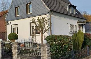 Einfamilienhaus kaufen in 59199 Bönen, Bönen - Ein-zweifamilienhaus mit 4 Garagen in guter Wohnlage