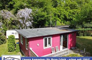 Haus kaufen in 23684 Scharbeutz, Scharbeutz-Pönitz - Einfaches Wochenendhaus in idyllischer Lage in Scharbeutz-Klingberg