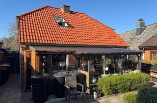 Einfamilienhaus kaufen in 25712 Burg, Burg (Dithmarschen) - Frisch modernisiert - charmantes Einfamilienhaus mit idyllischem Flair im Herzen des Ortes!