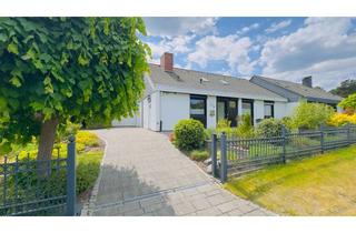 Doppelhaushälfte kaufen in 27711 Osterholz-Scharmbeck, Lichtdurchflutete Doppelhaushälfte mit Wintergarten, Garage, Carport und liebevoll angelegtem Garten