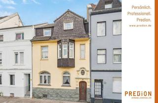 Haus kaufen in 40472 Unterrath, Hübsches Stadthaus mit Entwicklungspotenzial in Düsseldorf-Unterrath