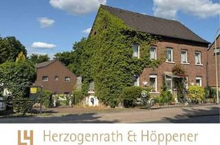 Haus kaufen in 52382 Niederzier, Investitionsobjekt mit Perspektive - Solides Mehrparteien-Ensemble mit Entwicklungspotential