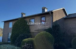 Reihenhaus kaufen in 40822 Mettmann, Reihenhaus mit Potenzial: Kamin, Anbau & Ausbaureserve im Dachgeschoss