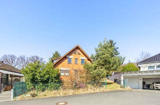 Einfamilienhaus kaufen in 35641 Schöffengrund, Eine Immobilie mit viel Potenzial: Großzügiges Einfamilienhaus in Schöffengrund-Niederquembach